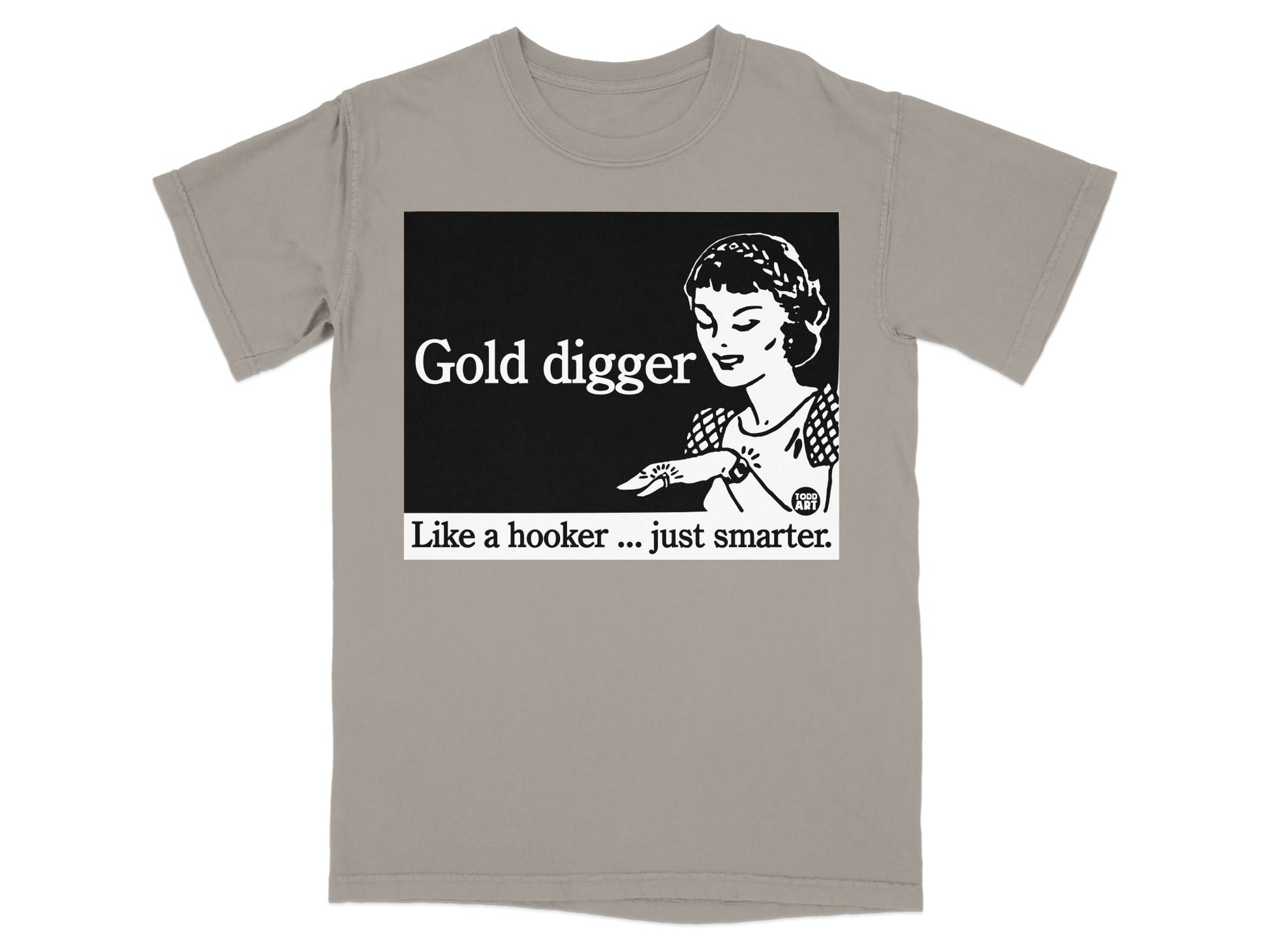Gold digger text with woman pointing, on a tan t-shirt.