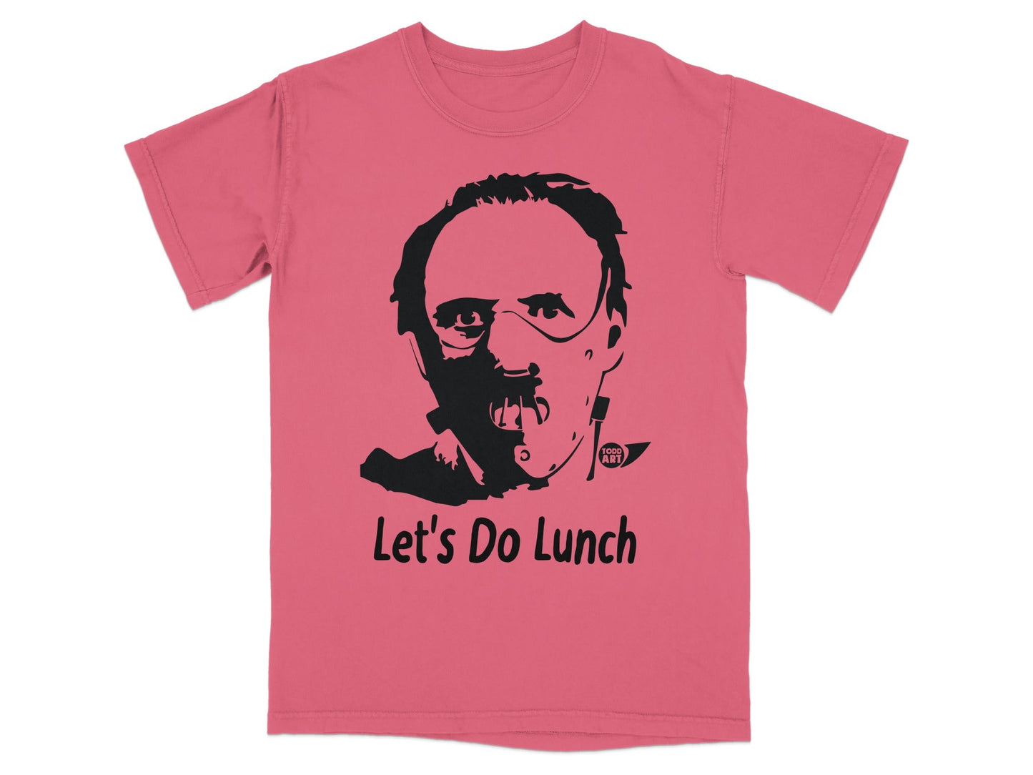 Pink t-shirt with black graphic of Hannibal Lecter saying "Let's Do Lunch."
