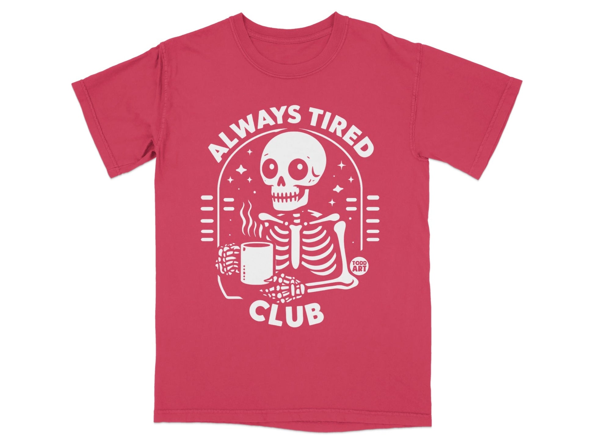 Red t-shirt with white graphic of a skeleton holding coffee, text "ALWAYS TIRED CLUB".