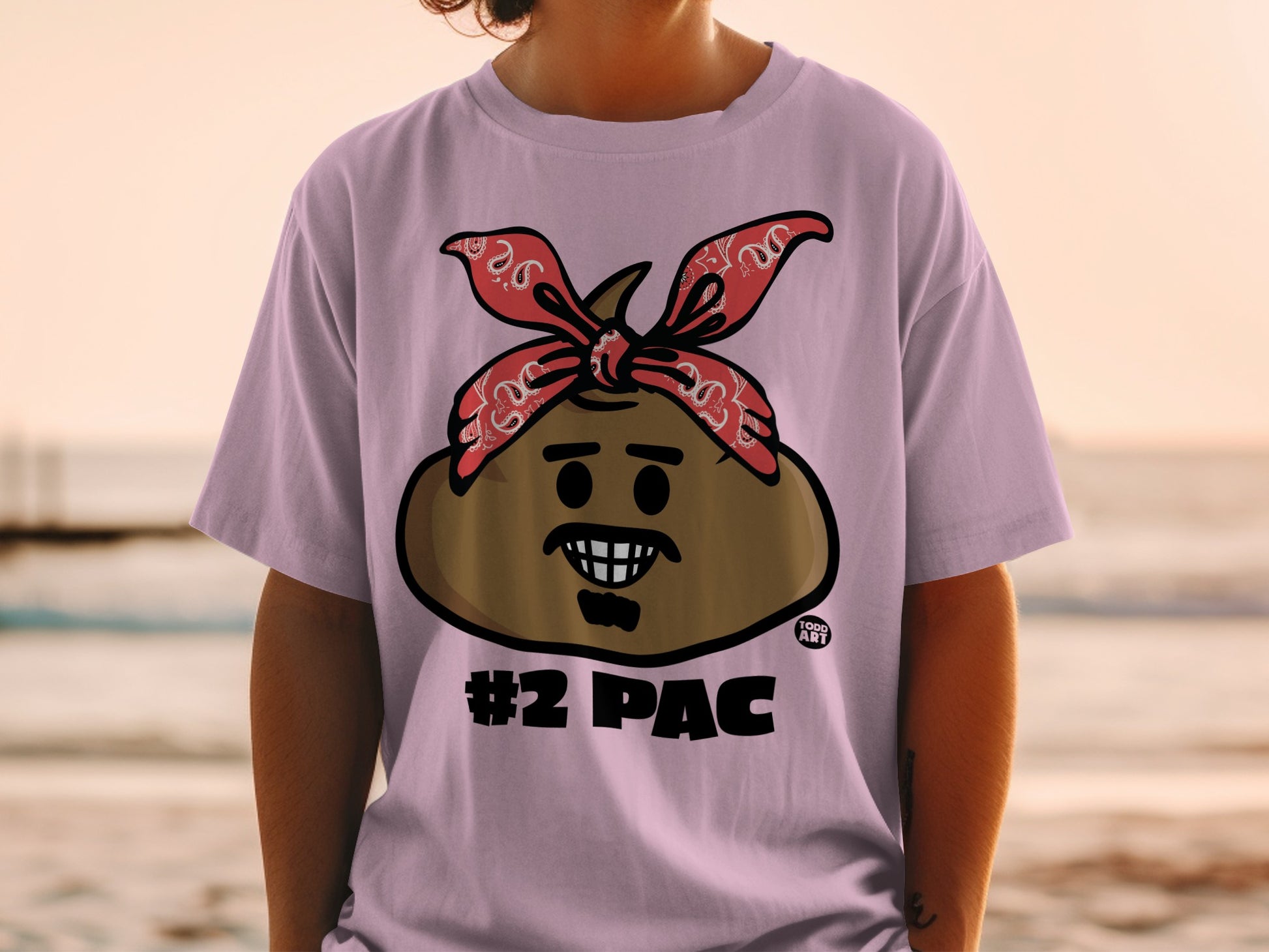 T-shirt with a Tupac-inspired emoji wearing a red bandana and "#2 PAC" text.