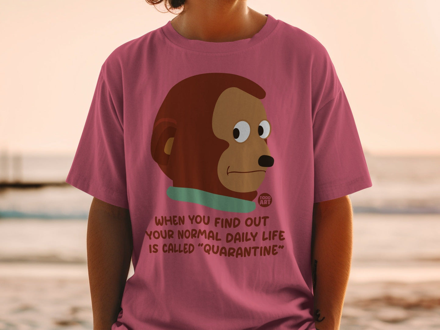 T-shirt with monkey looking away, text about quarantine.