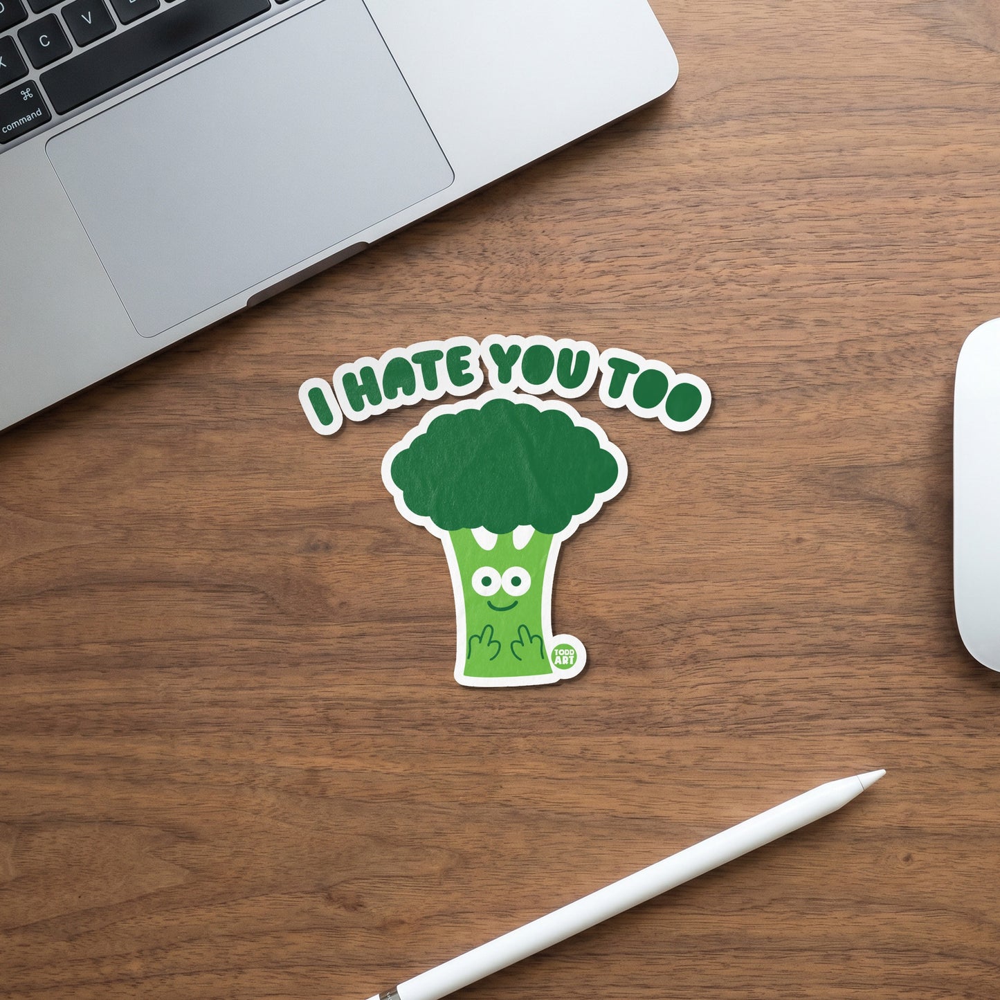 Broccoli sticker with "I HATE YOU TOO" text and cartoon broccoli giving the middle finger.
