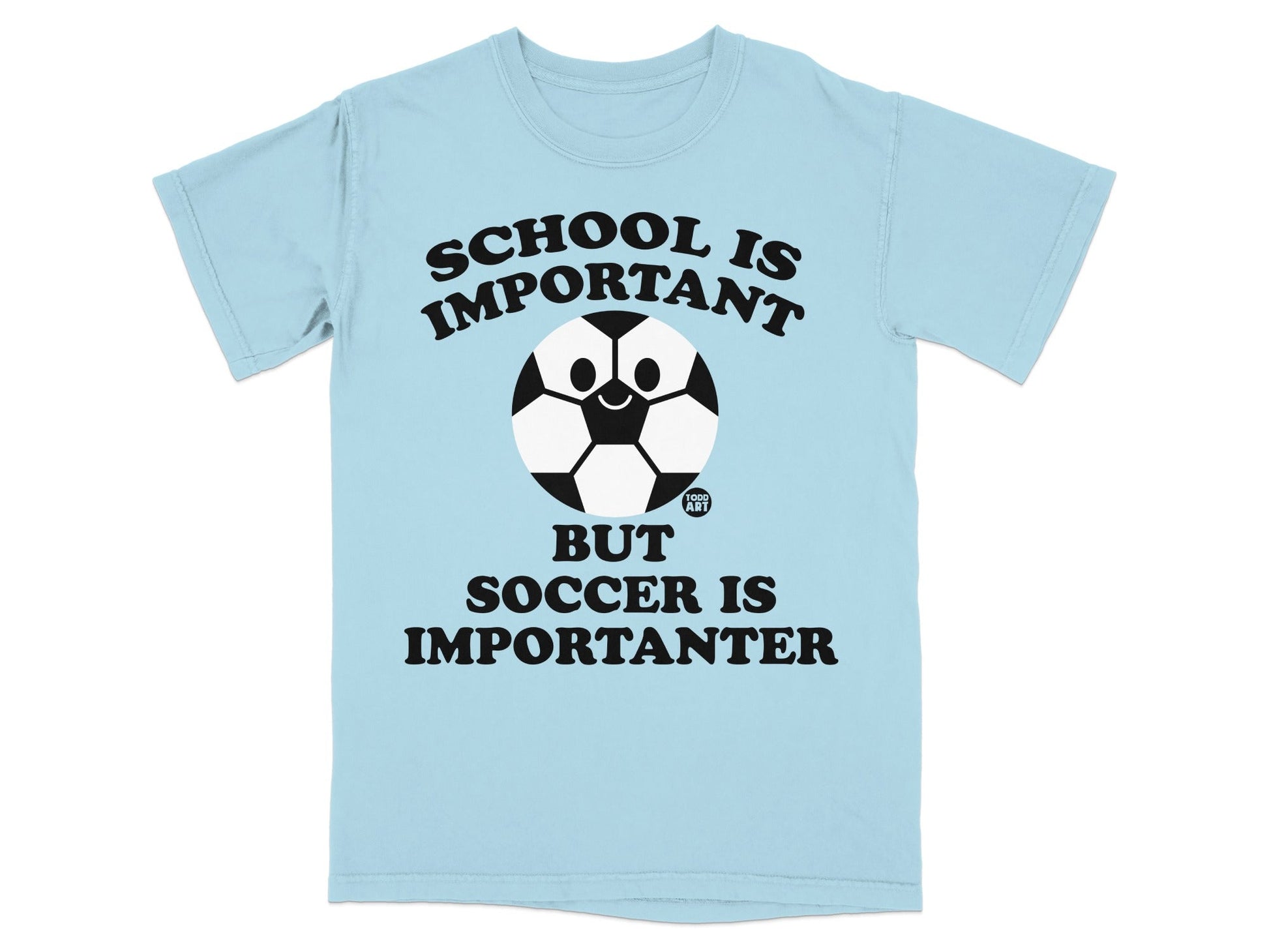 Light blue t-shirt with "SCHOOL IS IMPORTANT BUT SOCCER IS IMPORTANTER" and a smiling soccer ball.