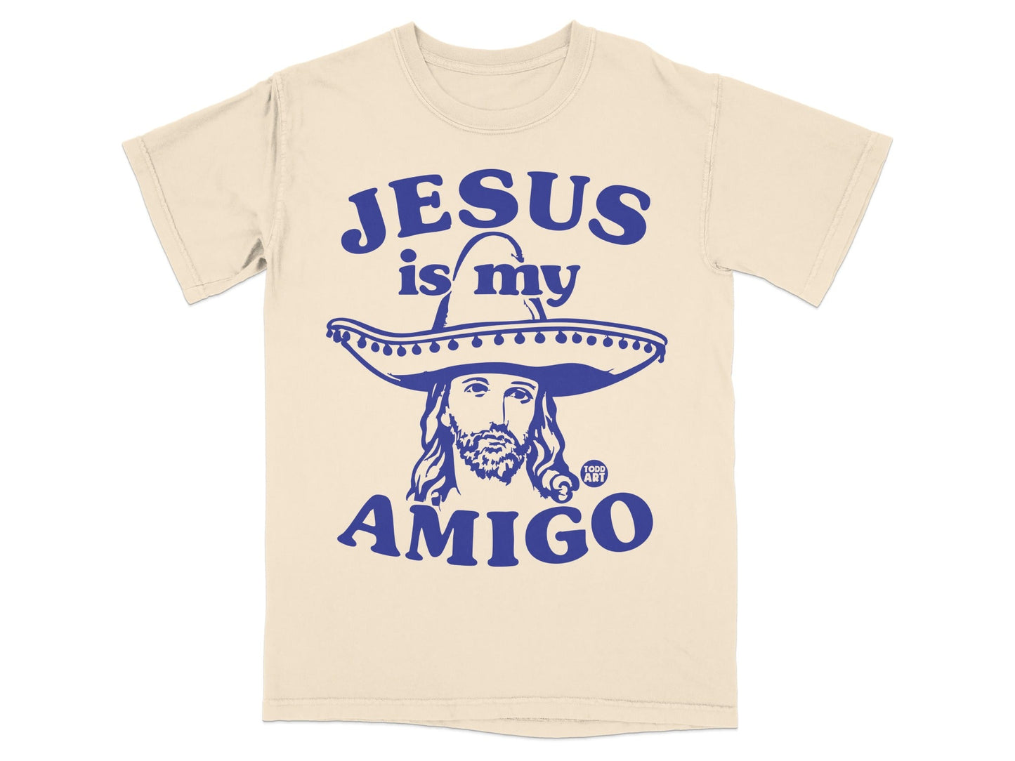 Cream t-shirt with "Jesus is my amigo" and Jesus wearing a sombrero.