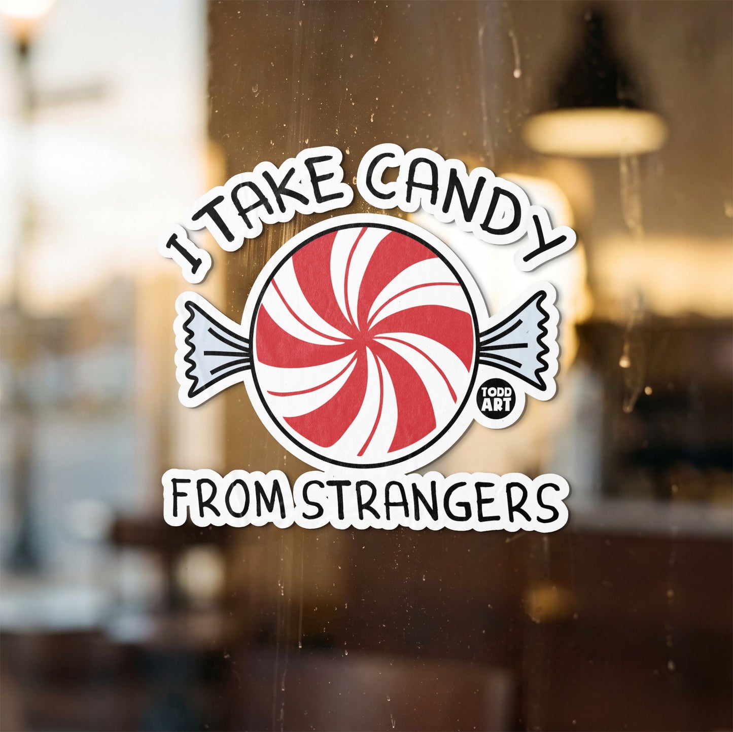 Sticker with red and white peppermint candy and text "I TAKE CANDY FROM STRANGERS"