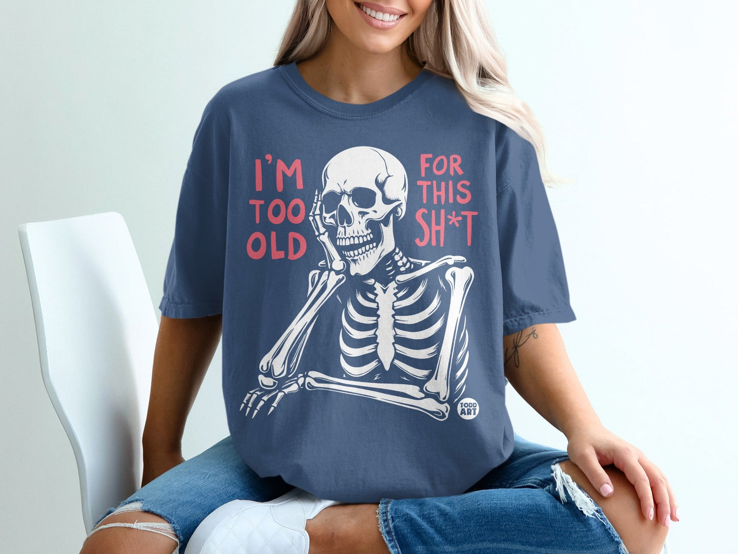 Skeleton wearing t-shirt with "I'm too old for this shit" text.