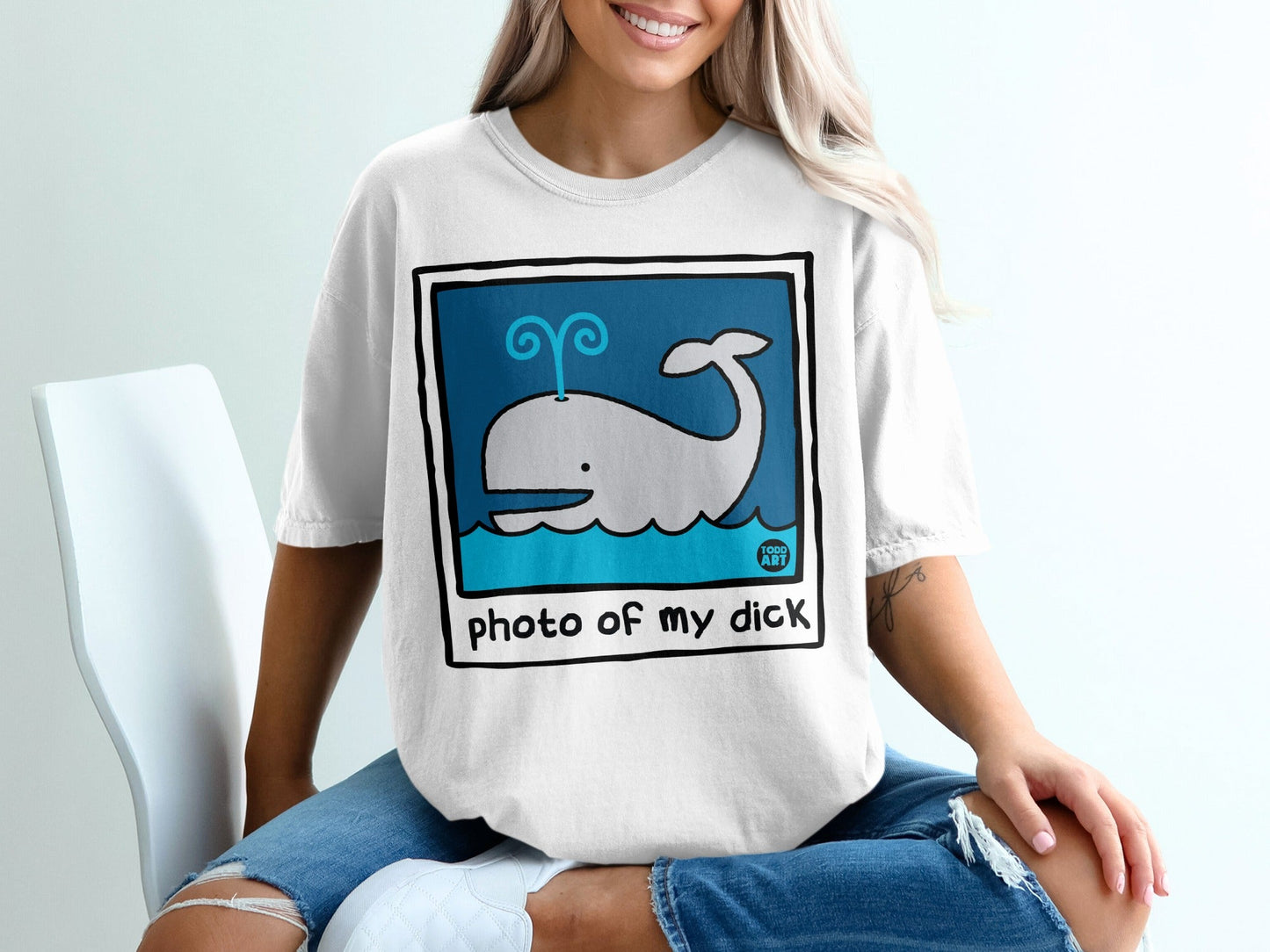 White t-shirt with cartoon whale and "photo of my dick" text.