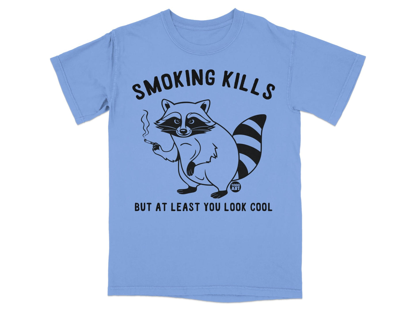 Light blue t-shirt with a raccoon smoking and the text "Smoking Kills But At Least You Look Cool."