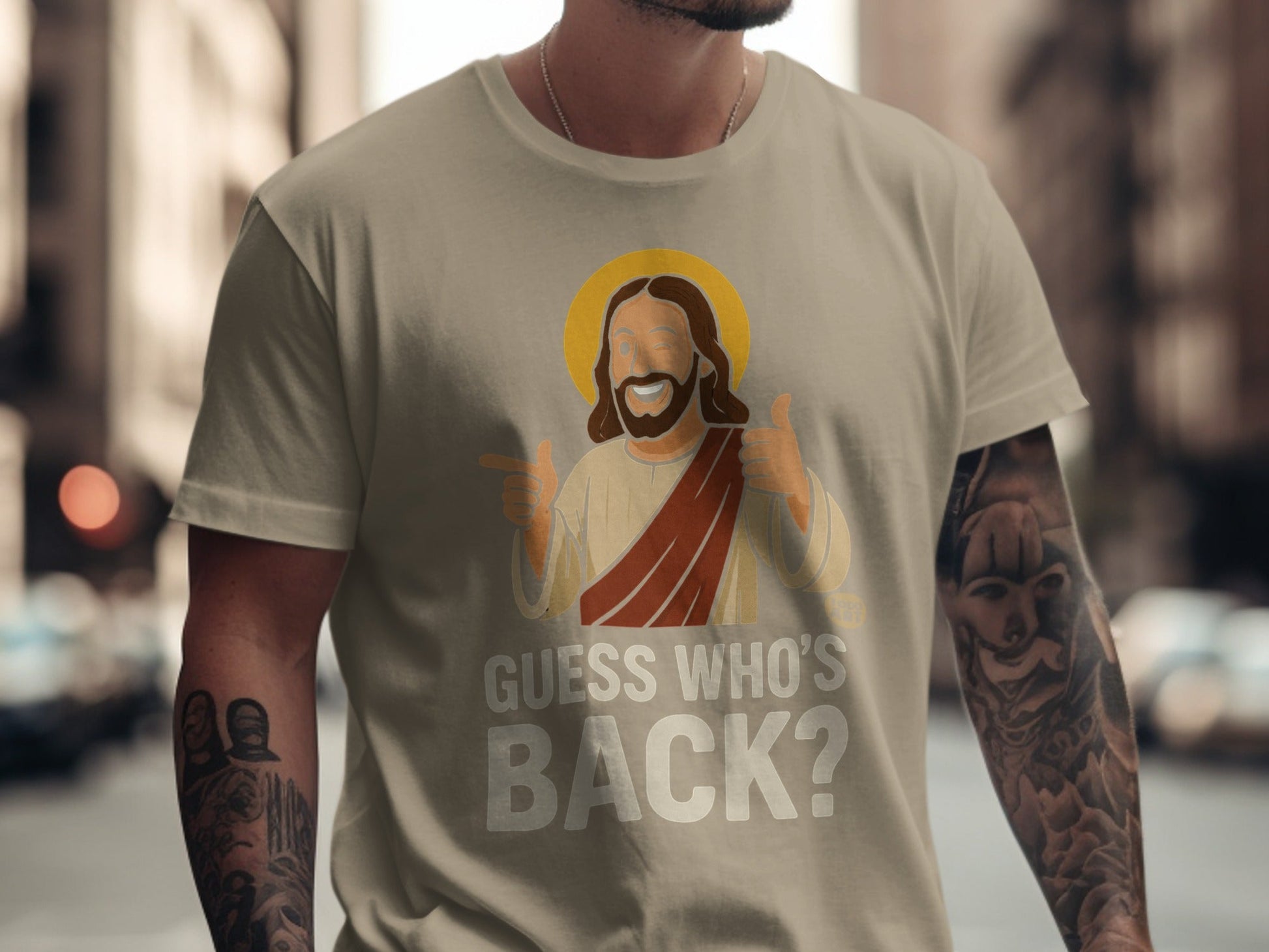 T-shirt with "Guess Who's Back?" and cartoon Jesus giving thumbs up.