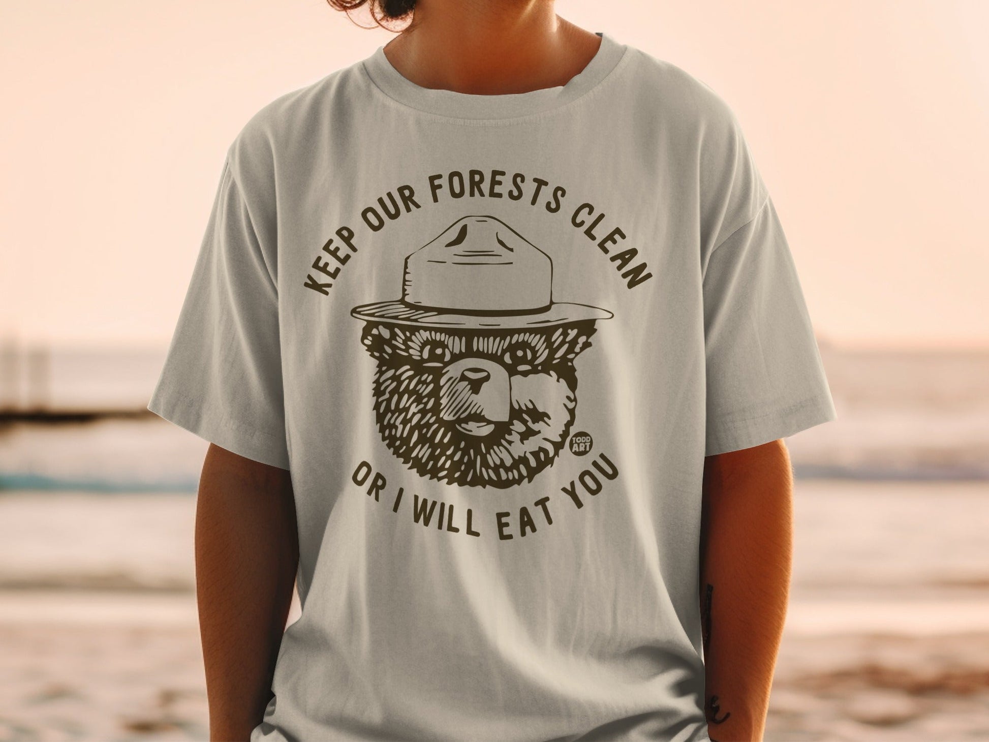 T-shirt with Smokey Bear graphic and "Keep our forests clean or I will eat you."