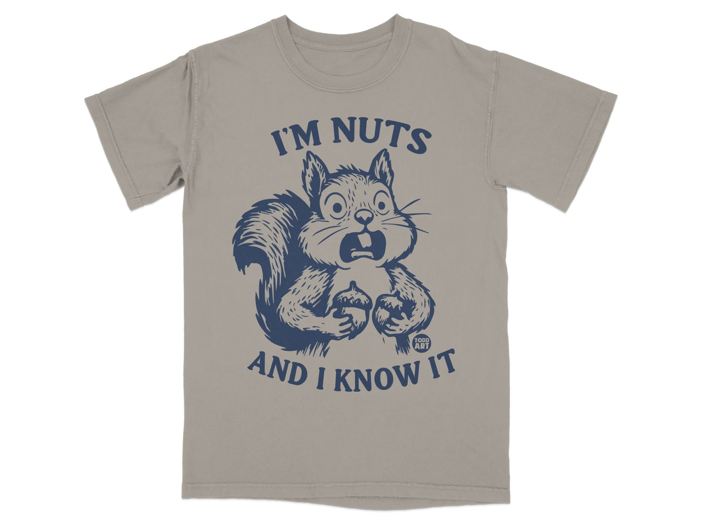 T-shirt with surprised squirrel holding acorns and text "I'M NUTS AND I KNOW IT".
