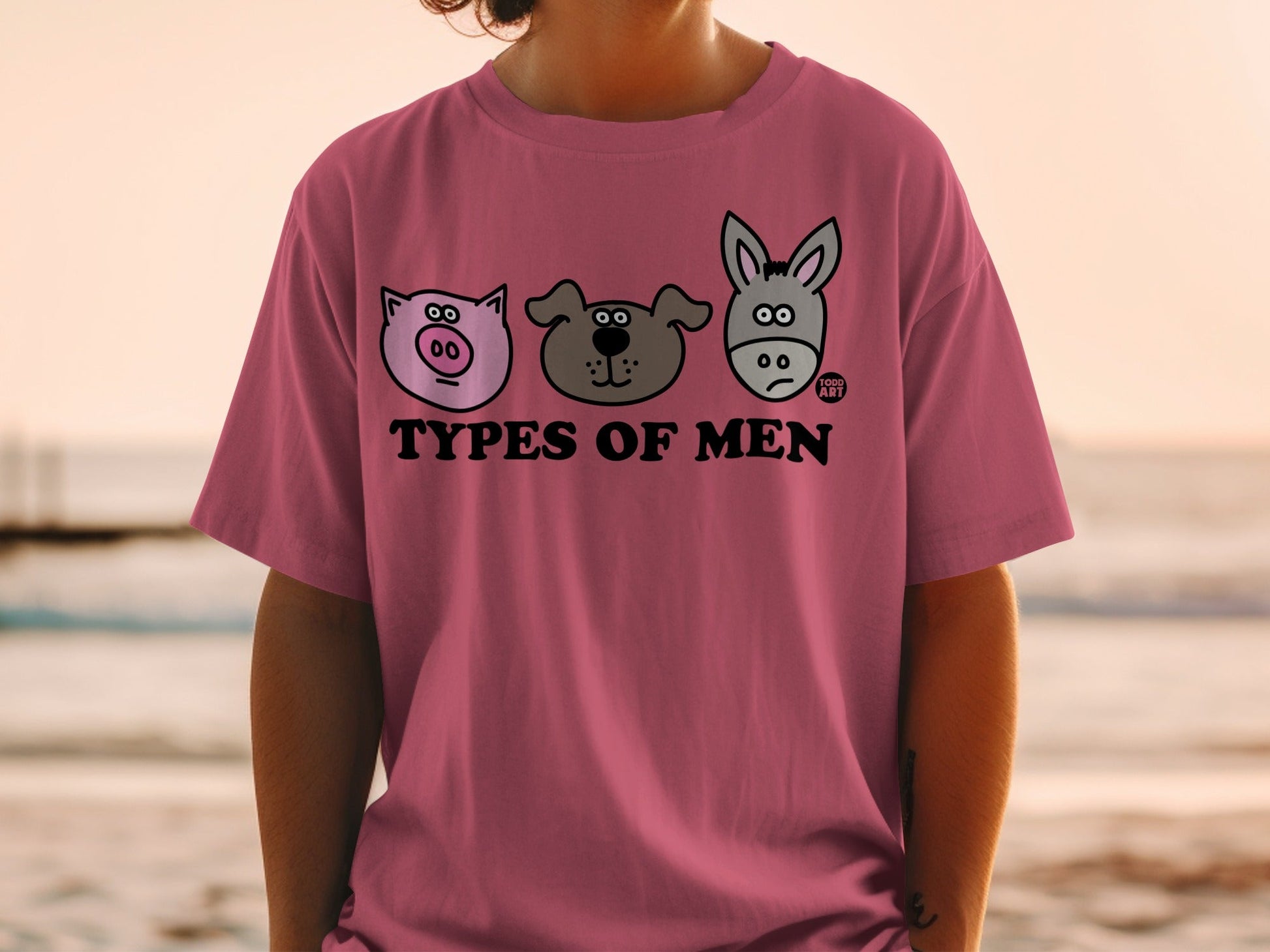 T-shirt with cartoon pig, dog, and donkey faces and "TYPES OF MEN" text.