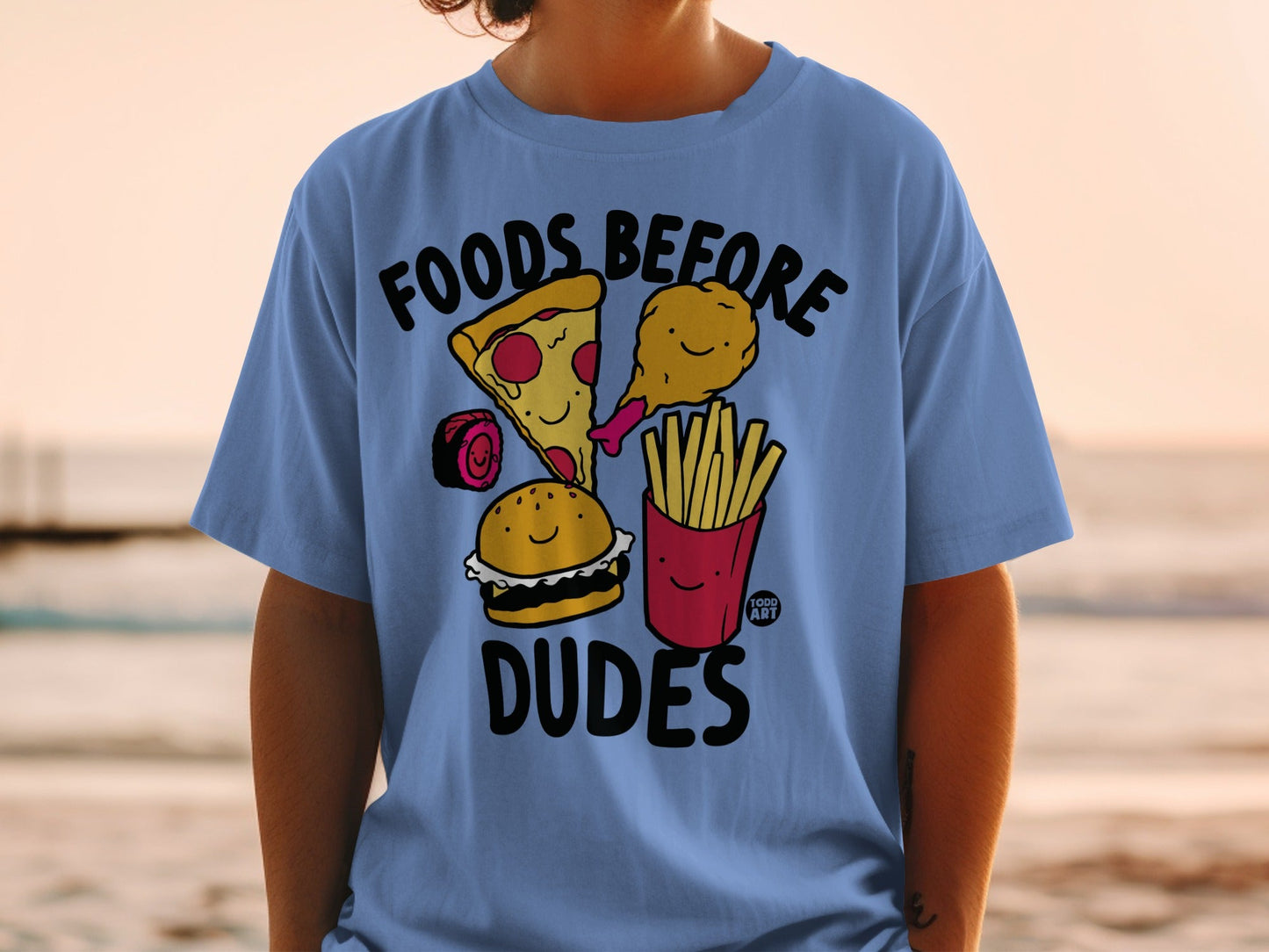 Blue t-shirt with cartoon pizza, burger, sushi, and fries eating food.