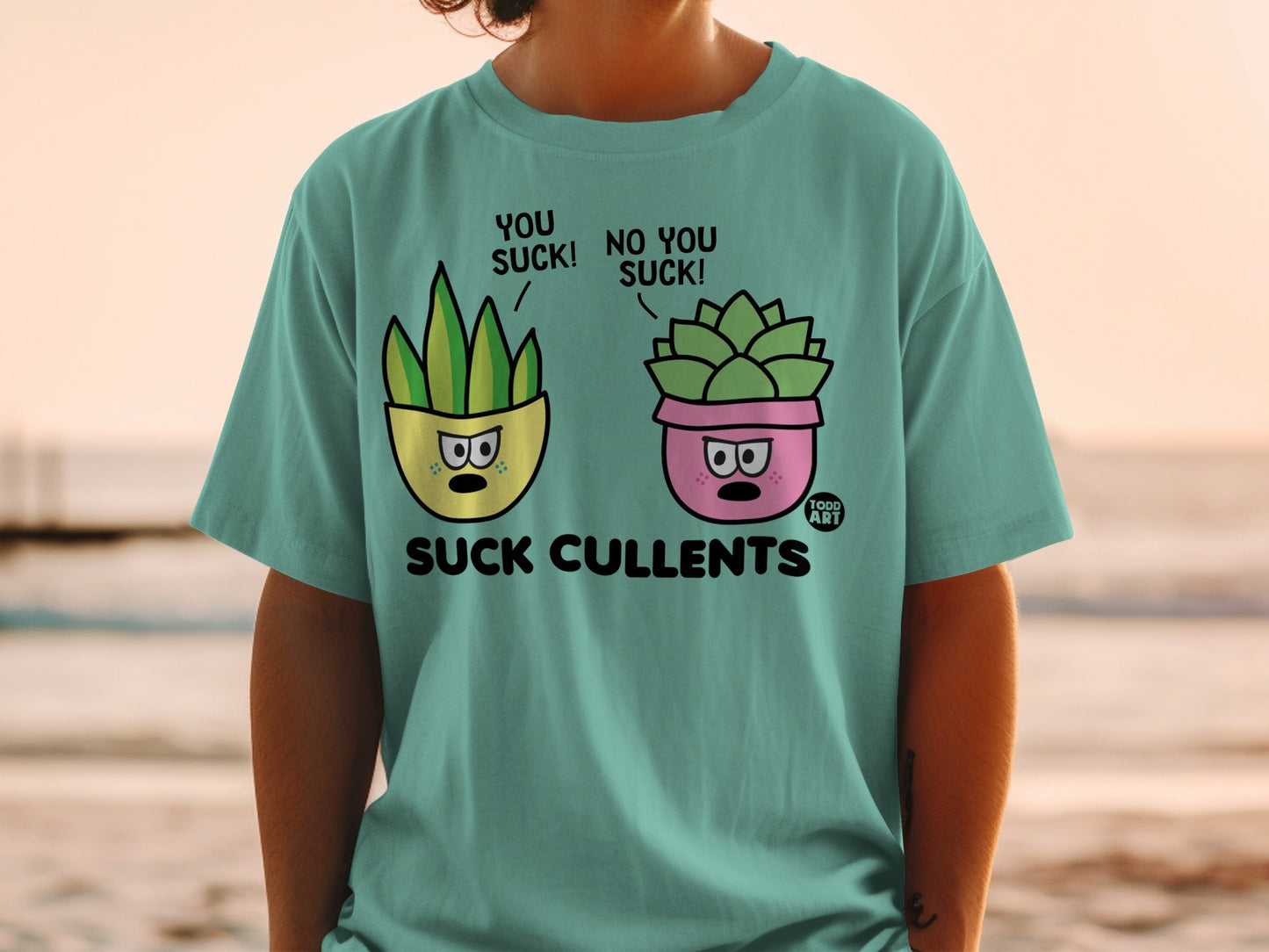 Succulent plants in pots with cartoon faces saying "You suck!".