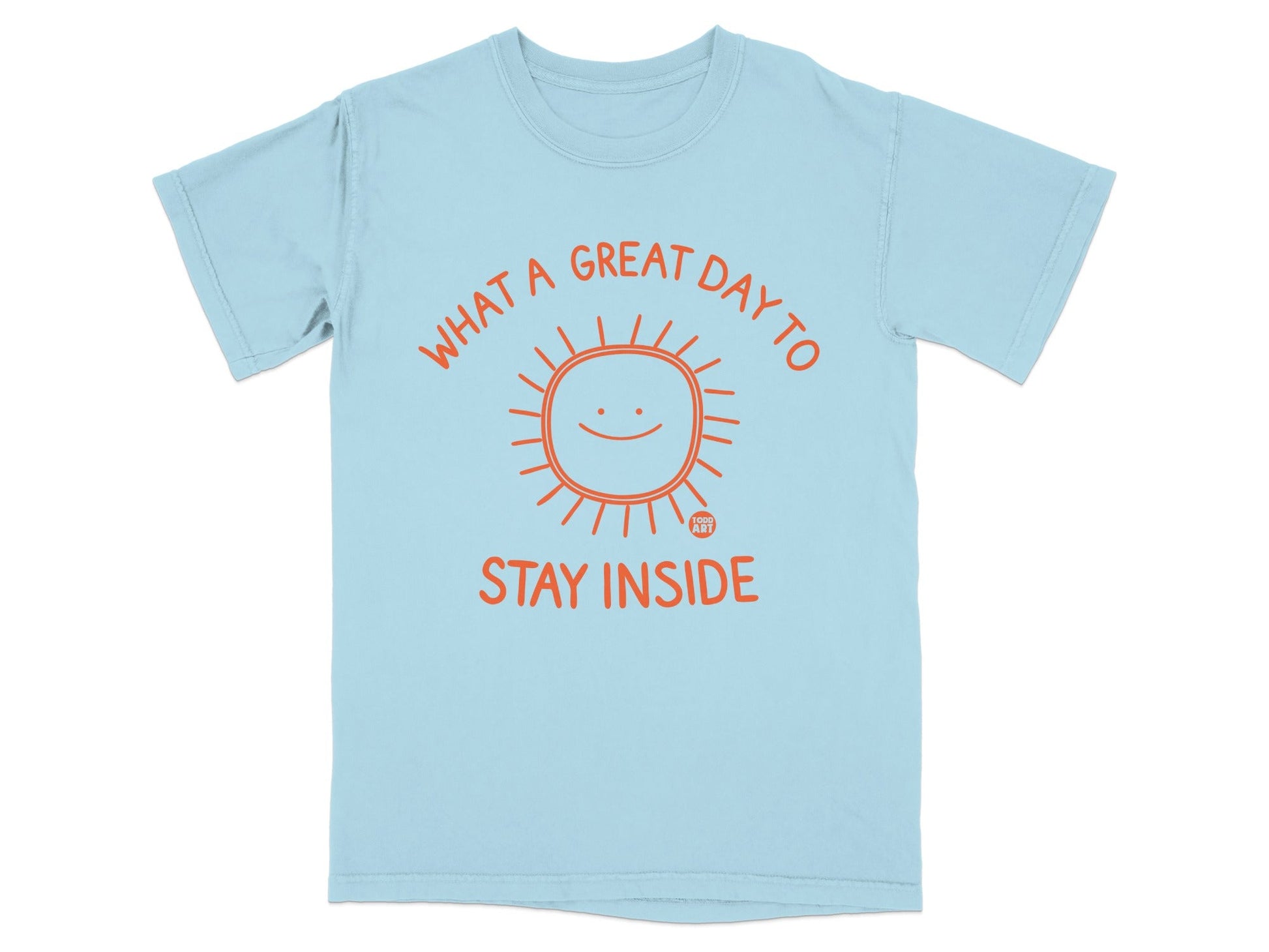 Light blue t-shirt with orange sun graphic and text "WHAT A GREAT DAY TO STAY INSIDE".