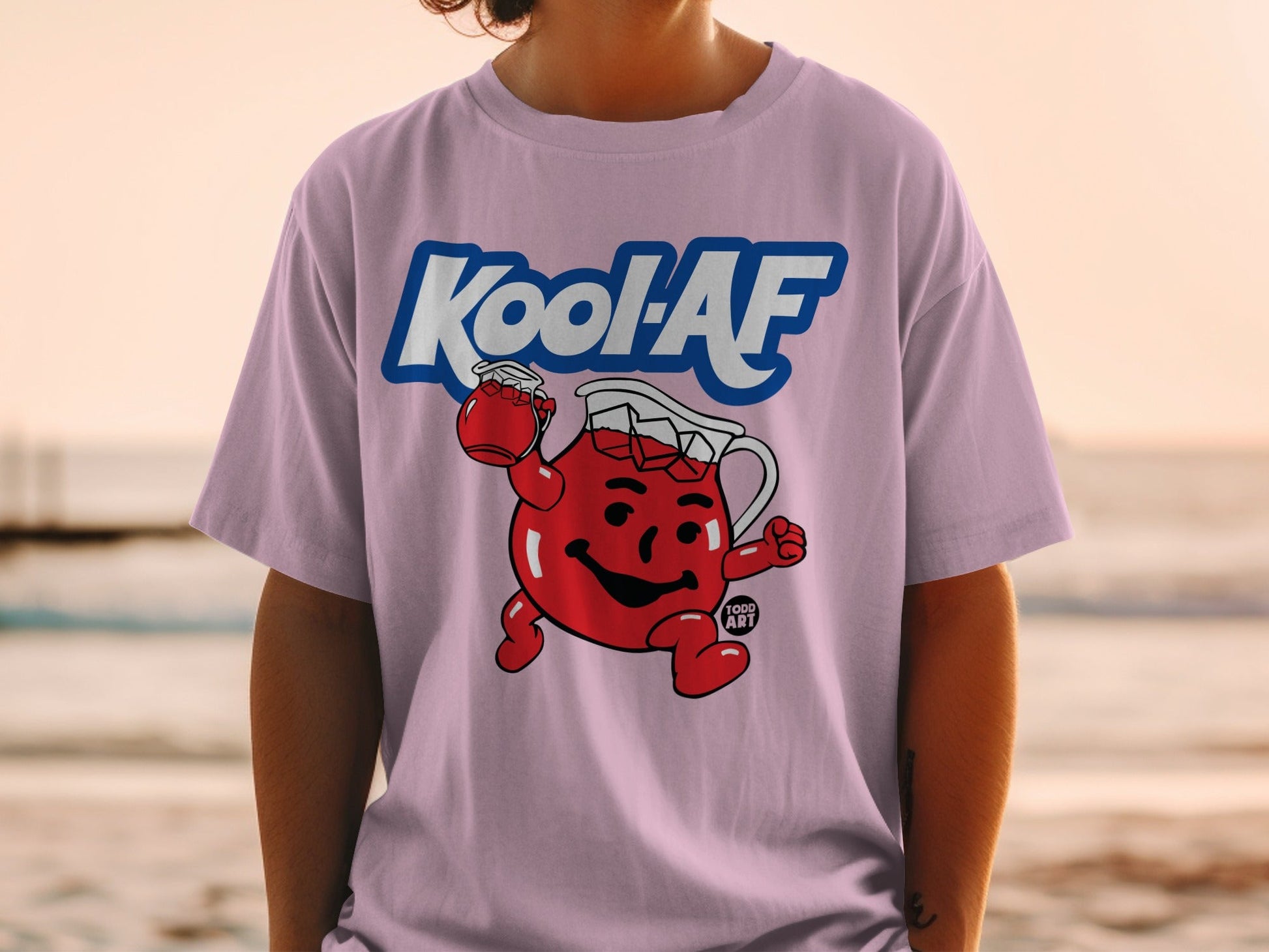 Kool-Aid character in t-shirt holding a pitcher and glass with Kool-AF text.