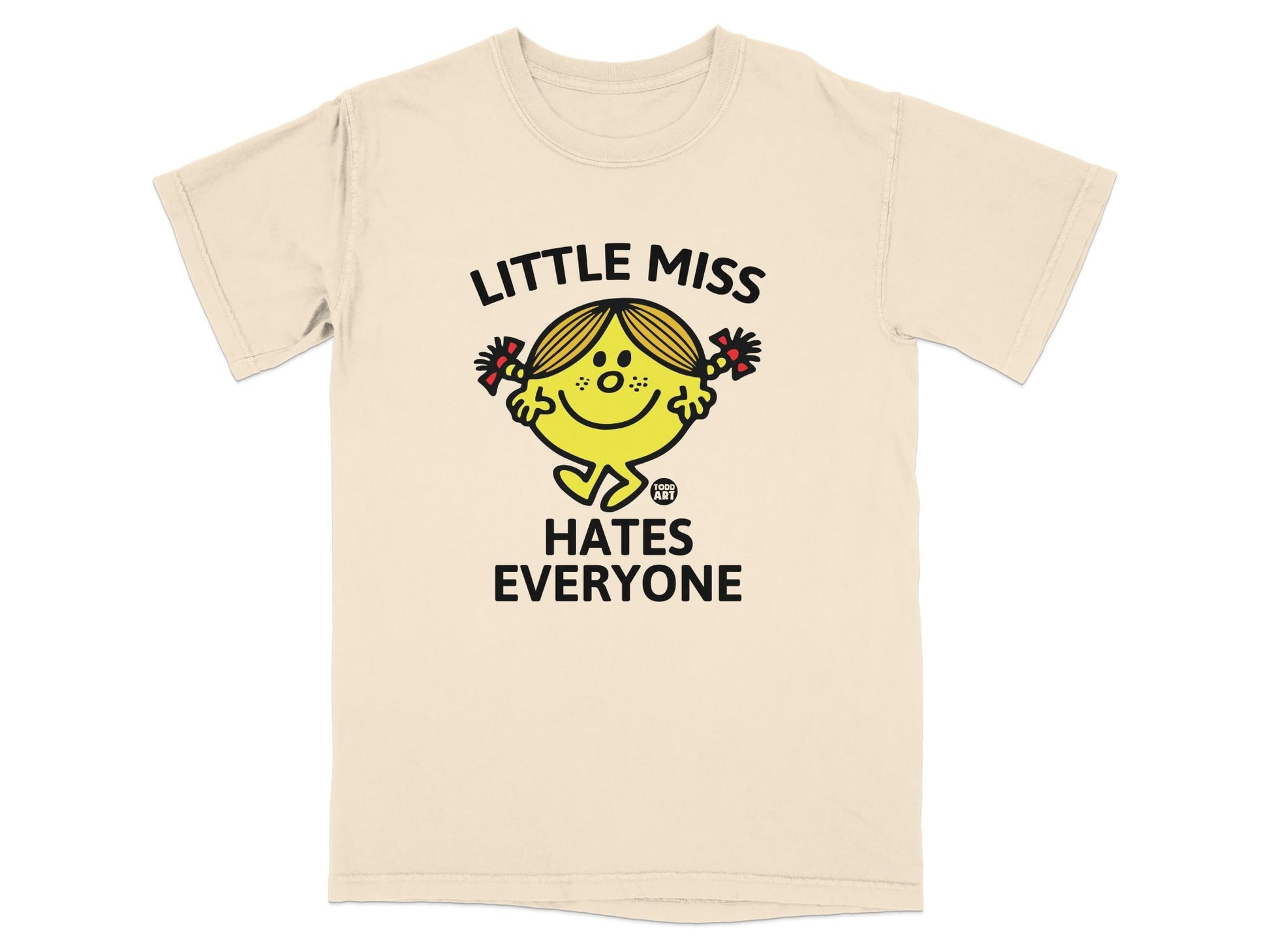Cream t-shirt with "Little Miss Hates Everyone" graphic featuring a cartoon character.