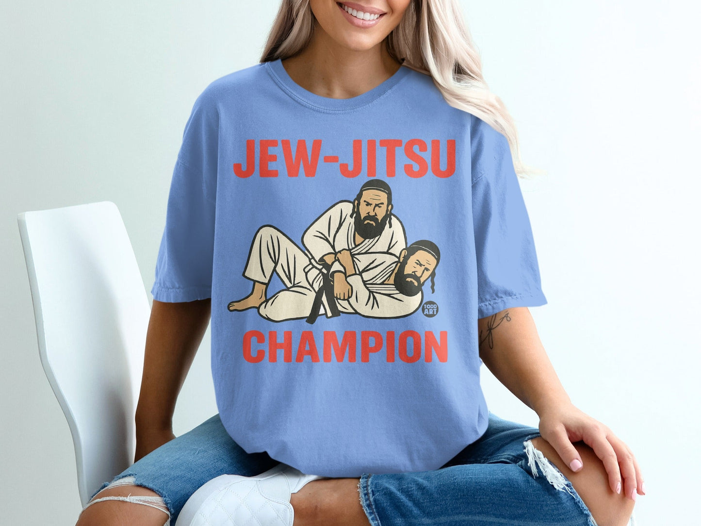Jew-Jitsu Champion graphic on a blue t-shirt.