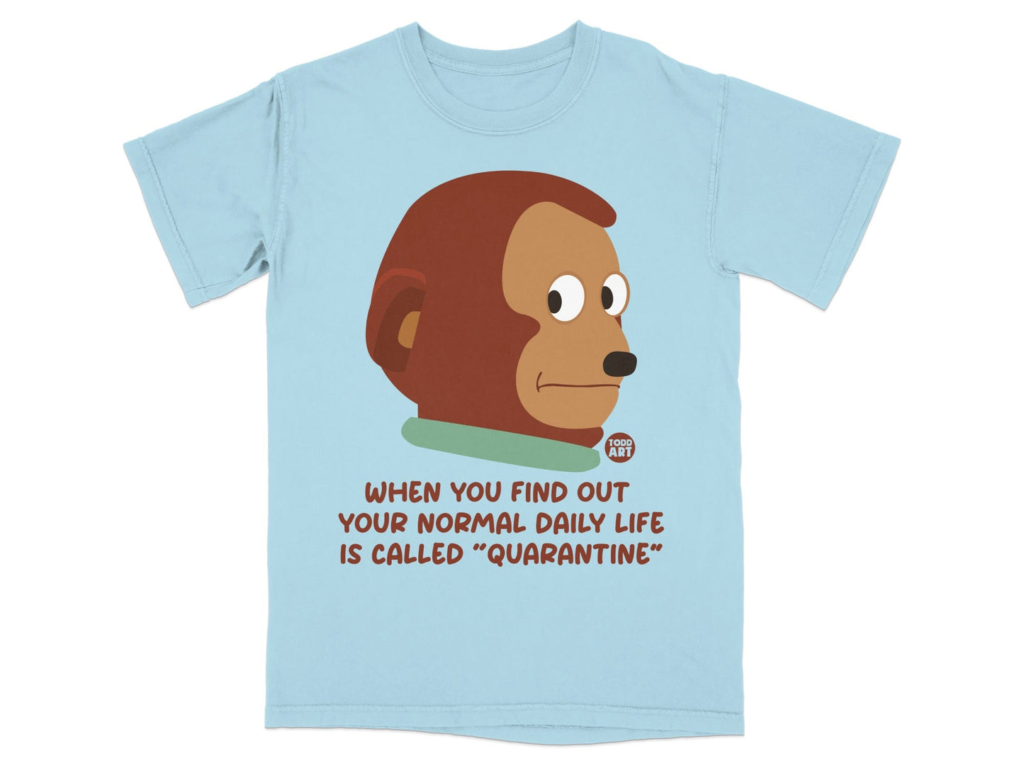 Light blue t-shirt with a monkey looking surprised and text about quarantine.