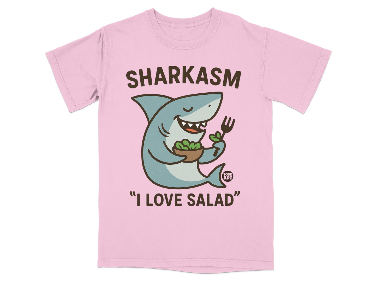 Pink t-shirt with cartoon shark holding a salad and saying "I LOVE SALAD".
