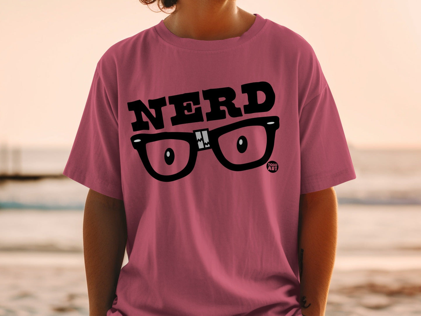 T-shirt with "NERD" text and cartoon glasses graphic.