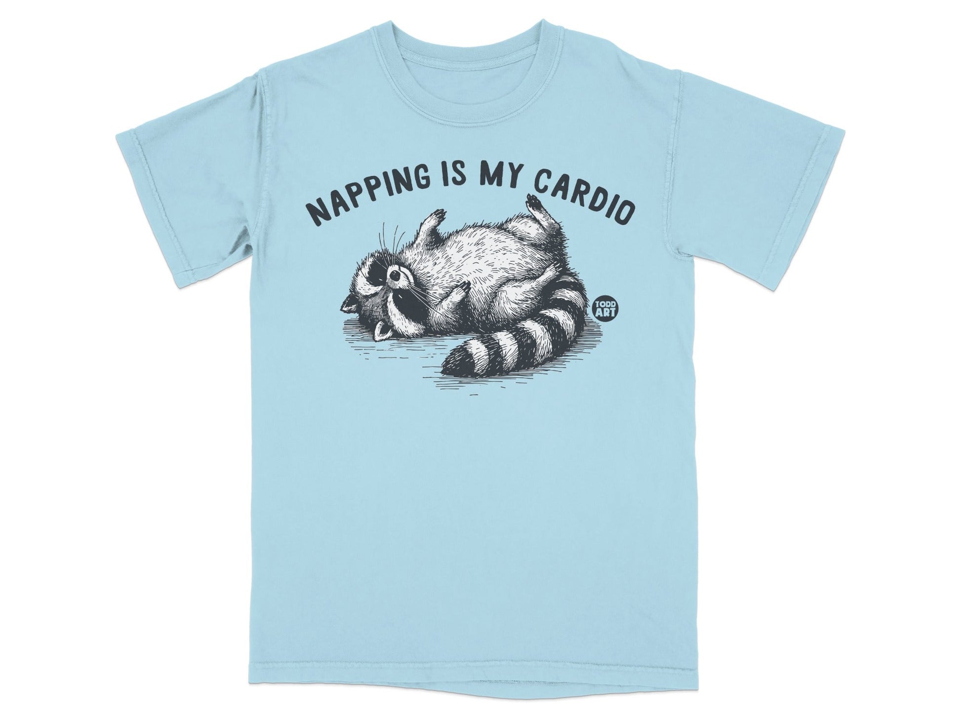 Light blue t-shirt with raccoon illustration and "Napping is my cardio" text.