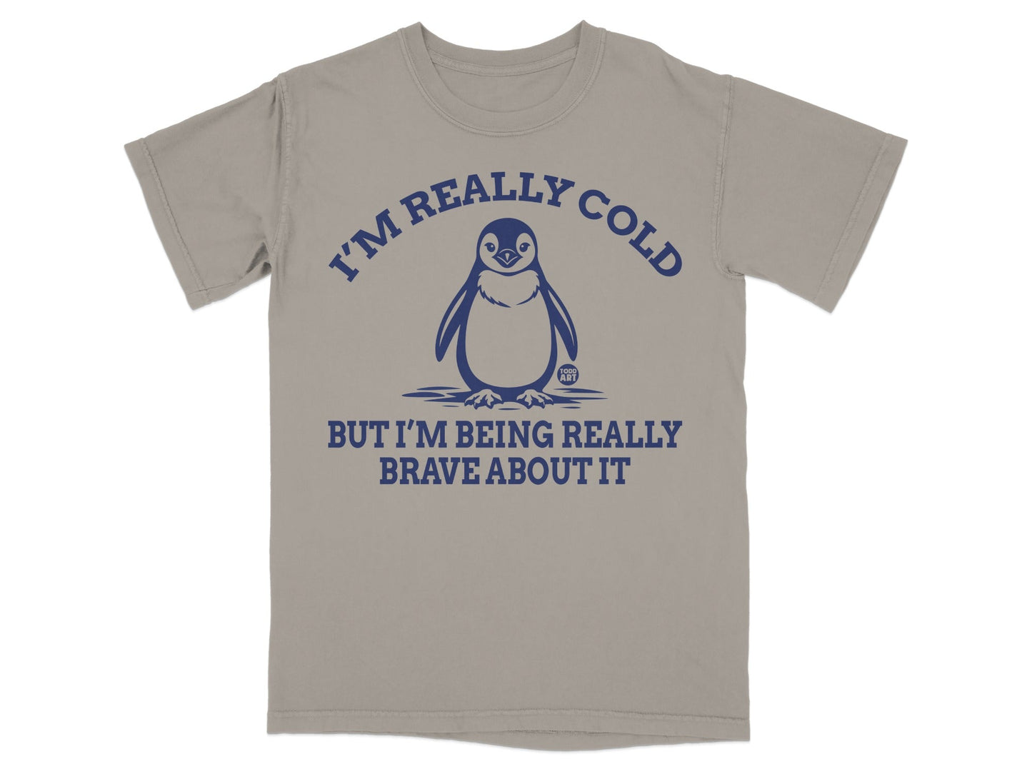 T-shirt with a penguin graphic and text reading "I'm really cold but I'm being really brave about it."