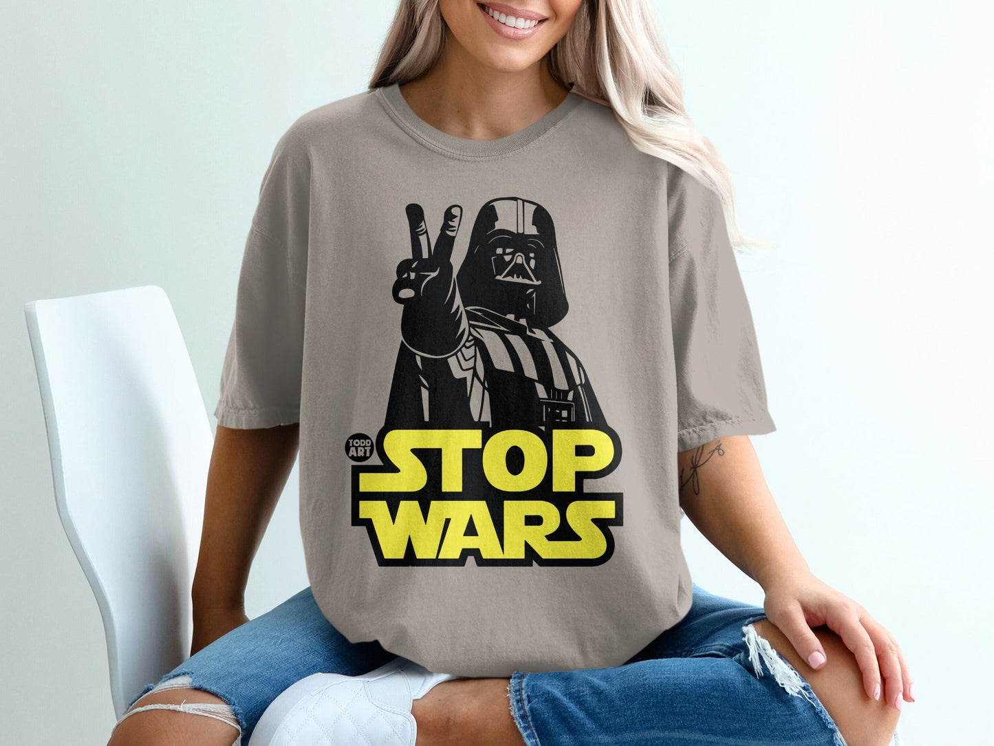 T-shirt with Darth Vader giving peace sign and "Star Wars" text.