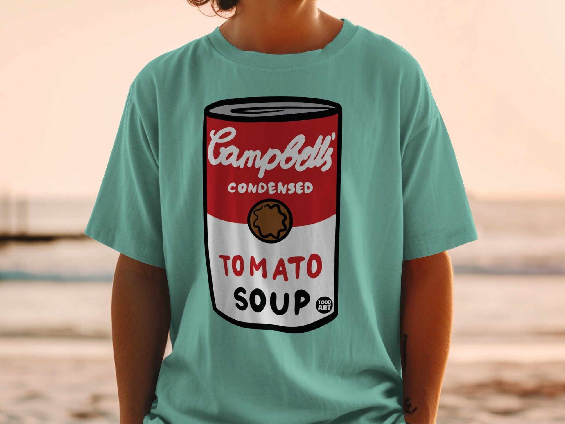 Teal t-shirt with Campbell's Condensed Tomato Soup label design.