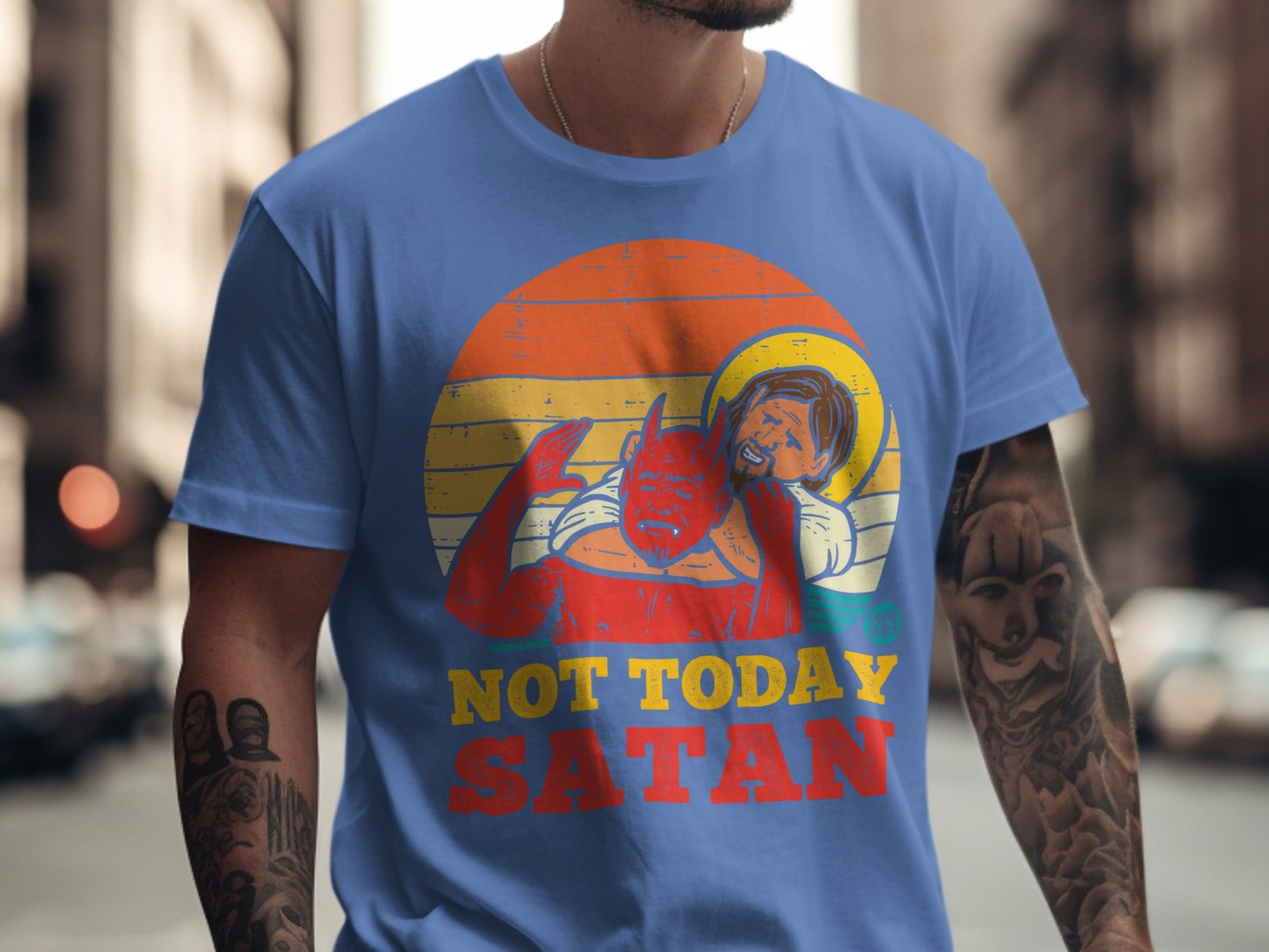Blue t-shirt with "NOT TODAY SATAN" and illustration of Jesus pushing Satan away.