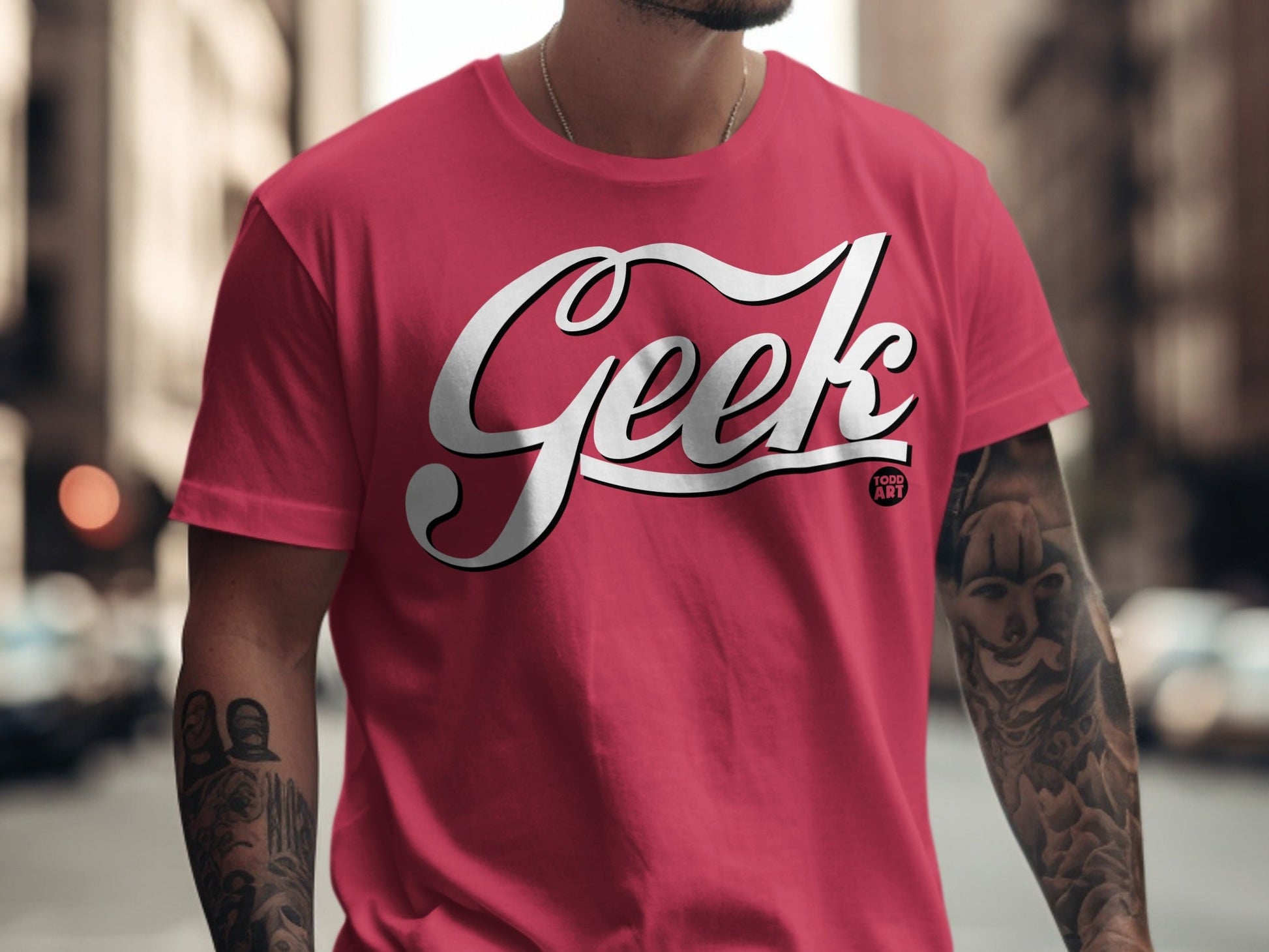 Pink t-shirt with white "Geek" lettering and "Food Art" logo.