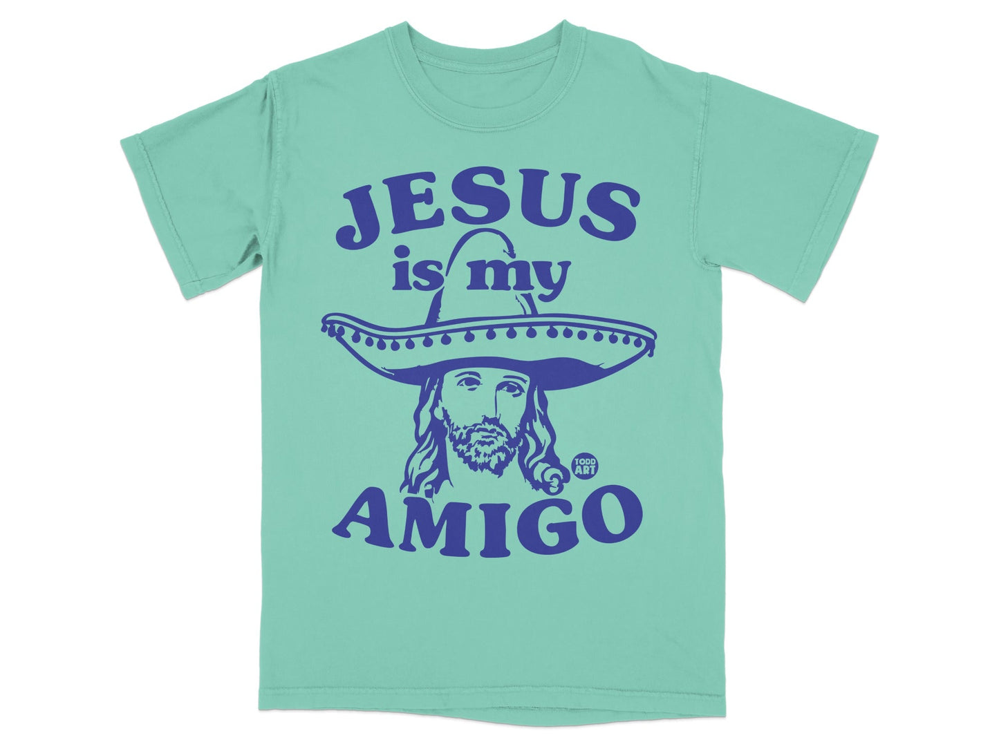 Teal t-shirt with blue text "JESUS is my AMIGO" and graphic of Jesus in a sombrero.