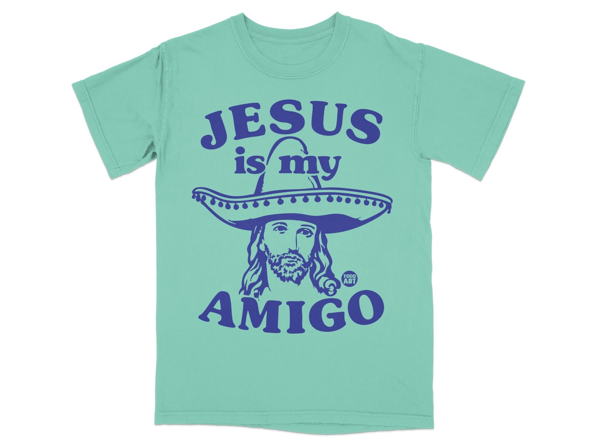 Teal t-shirt with blue text "JESUS is my AMIGO" and graphic of Jesus in a sombrero.