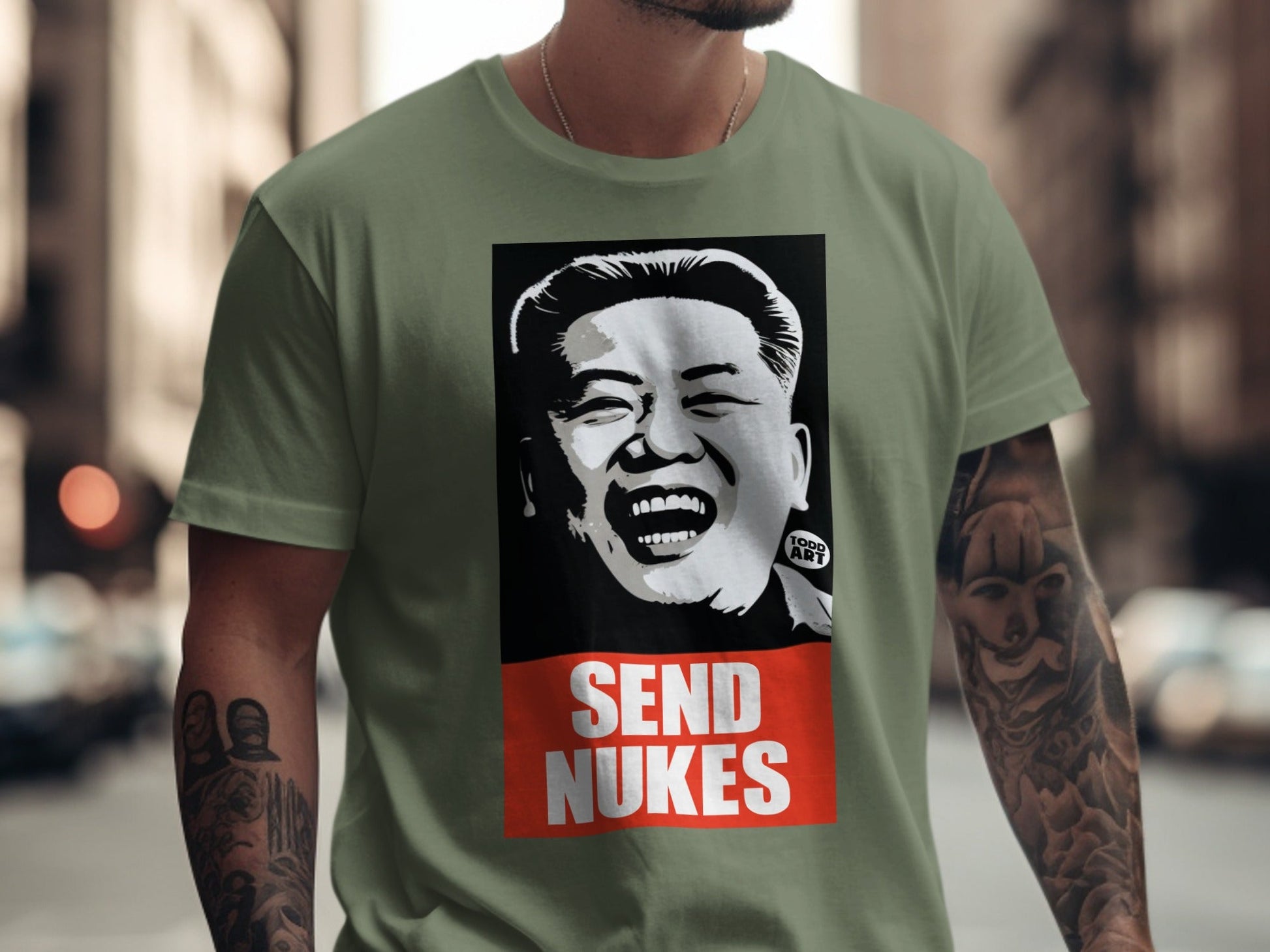 Kim Jong Un portrait on a green t-shirt with "SEND NUKES" text.